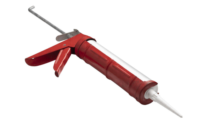 Work tools, Caulk gun isolated on white background