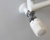 Adjust a thermostatic valve to save energy. Energy saving in dom