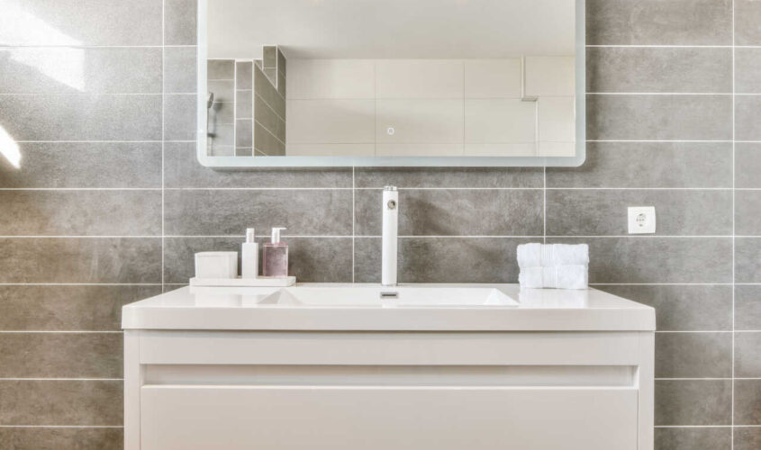 Sink and mirror in modern bathroom